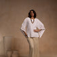 Cord Set - White cotton relaxed-fit top with round neck and sleeves