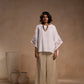 Cord Set - White cotton relaxed-fit top with round neck and sleeves