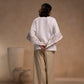 Cord Set - White cotton relaxed-fit top with round neck and sleeves
