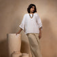 Cord Set - White cotton relaxed-fit top with round neck and sleeves
