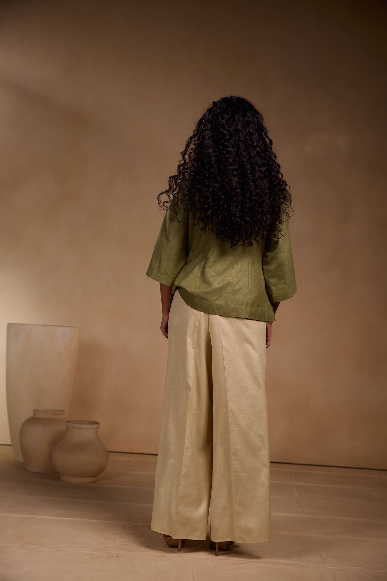 Crossover pleated top