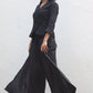 Black linen crossover top with embroidered sleeves