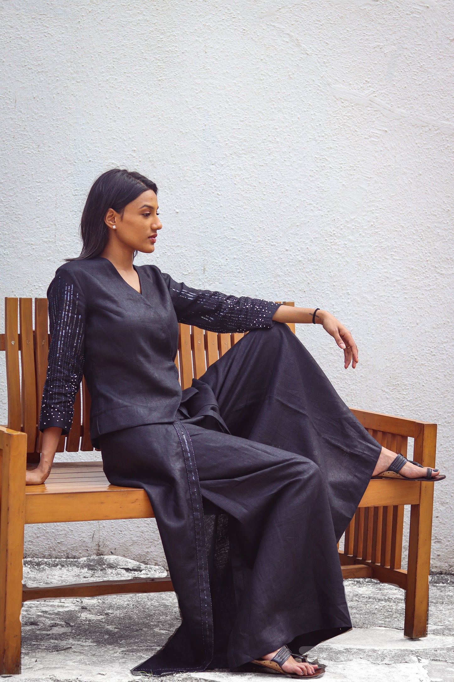 Black linen crossover top with embroidered sleeves