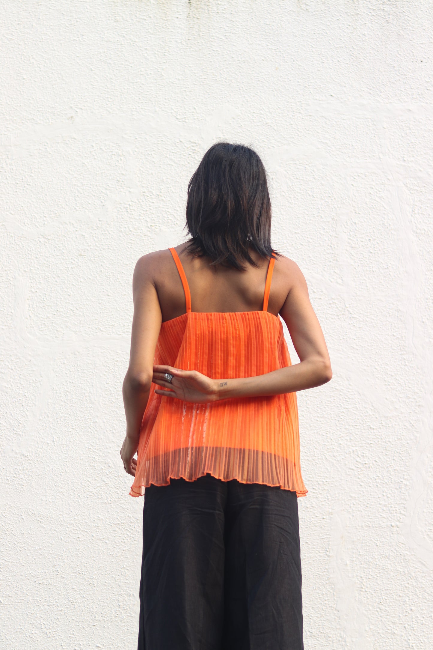 Orange pleated top